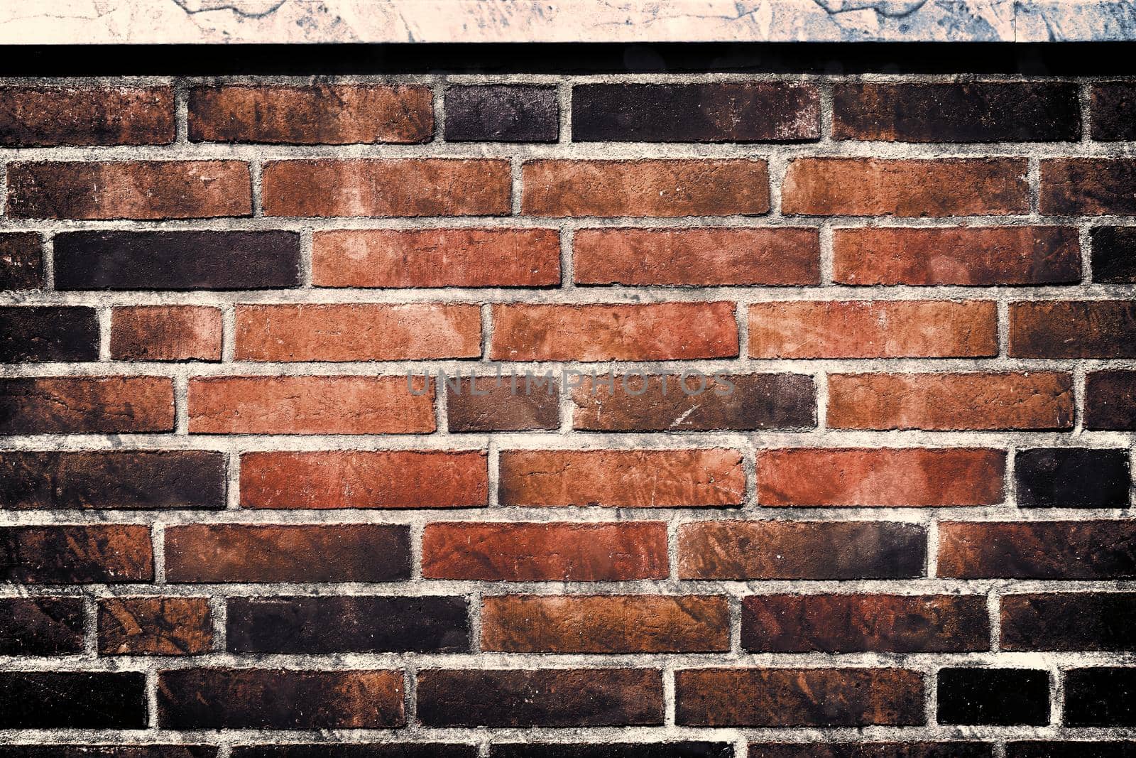 Aged and weathered old brick wall texture in a vintage retro design 