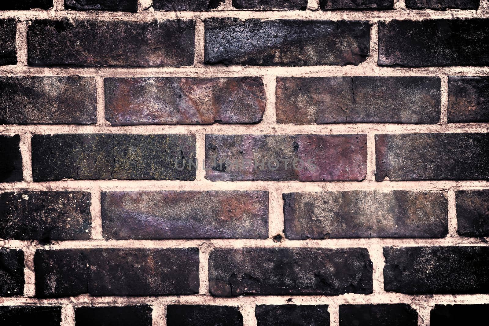 Aged and weathered old brick wall texture in a vintage retro design 