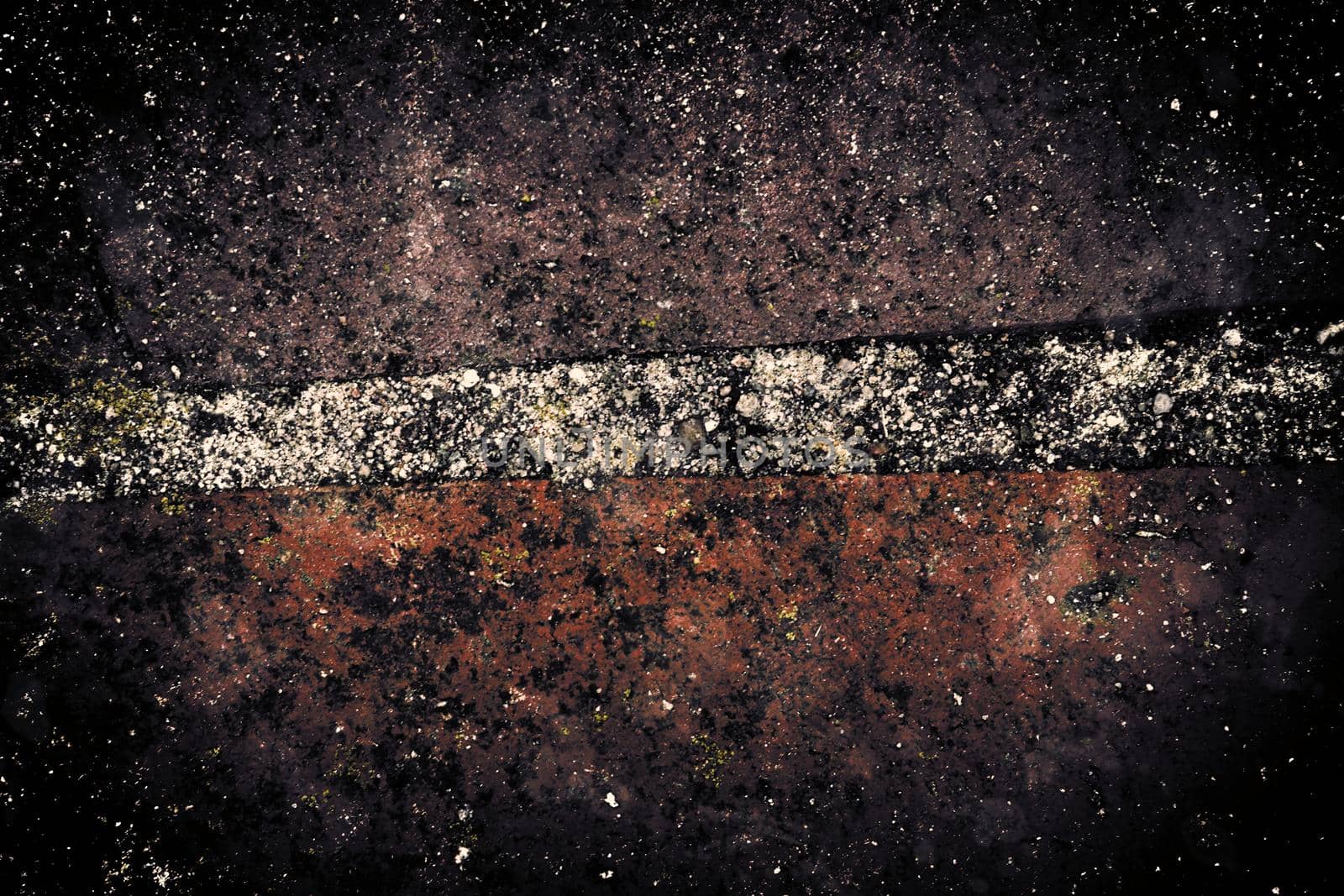 Aged and weathered old brick wall texture in a vintage retro design 