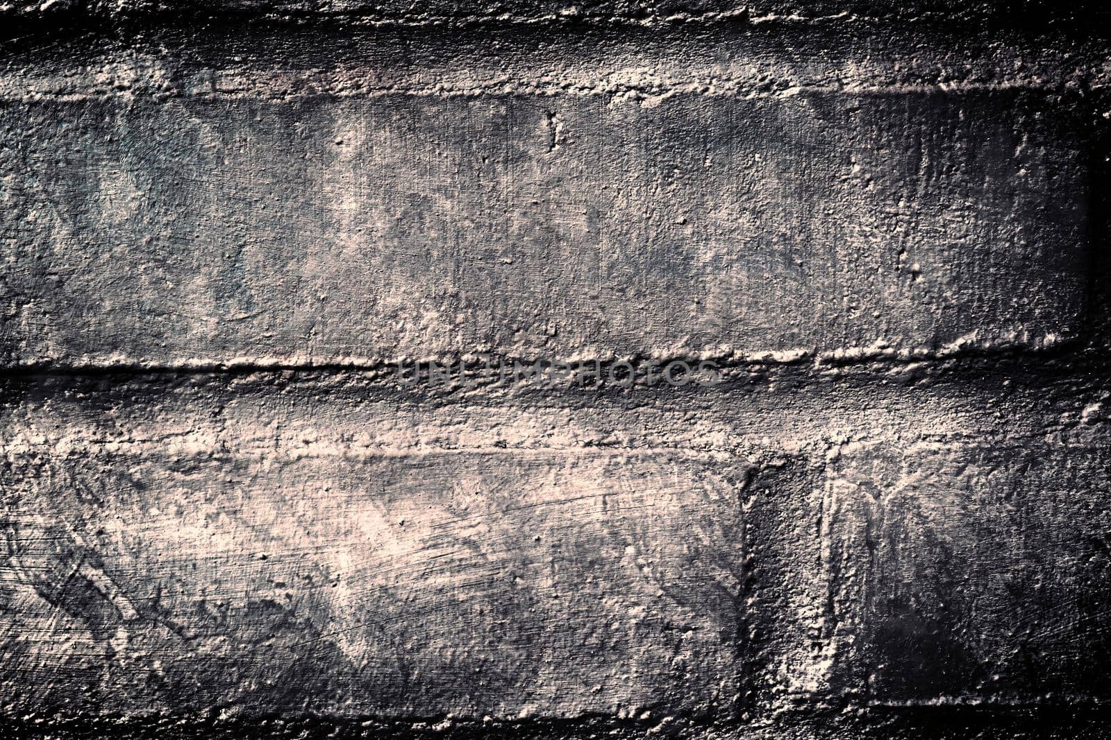 Aged and weathered old brick wall texture in a retro vintage design  by MP_foto71