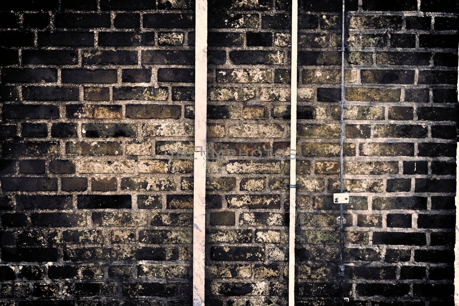 Aged and weathered old brick wall texture in a vintage retro design 