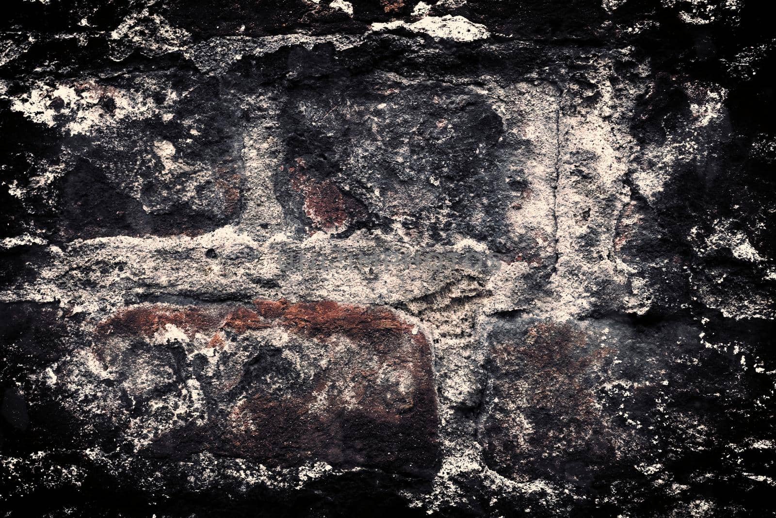 Aged and weathered old brick wall texture in a retro vintage design  by MP_foto71