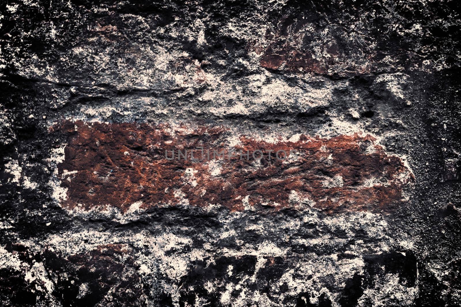 Aged and weathered old brick wall texture in a retro vintage design  by MP_foto71