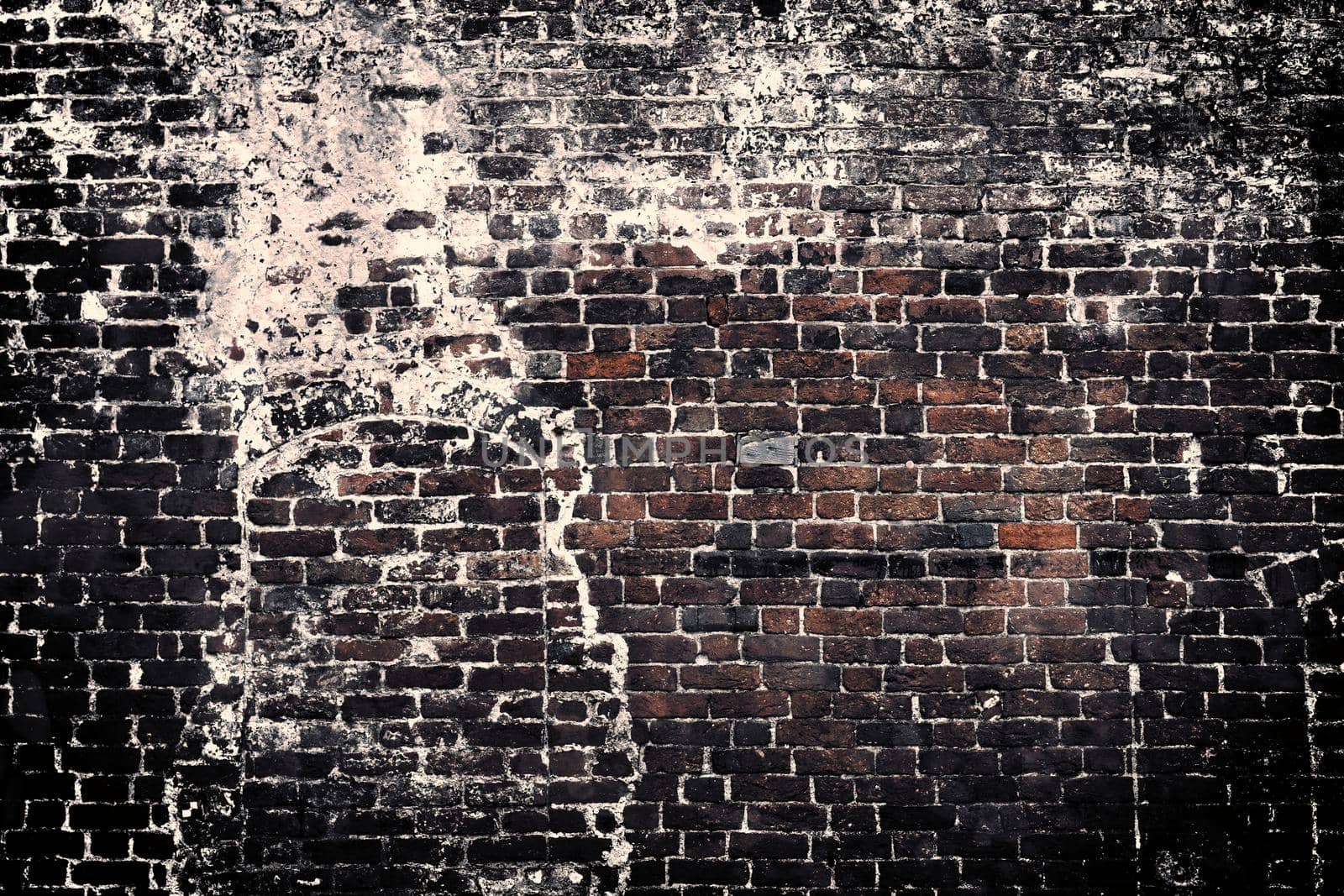 Aged and weathered old brick wall texture in a retro vintage design  by MP_foto71