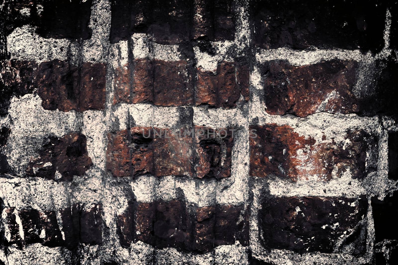 Aged and weathered old brick wall texture in a vintage retro design 