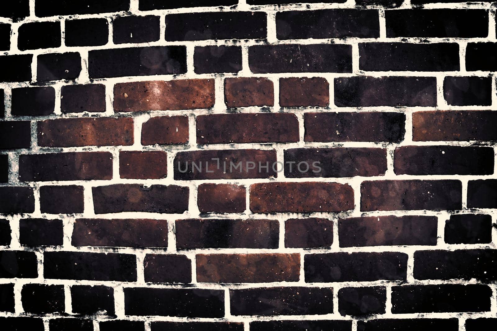 Aged and weathered old brick wall texture in a vintage retro design 