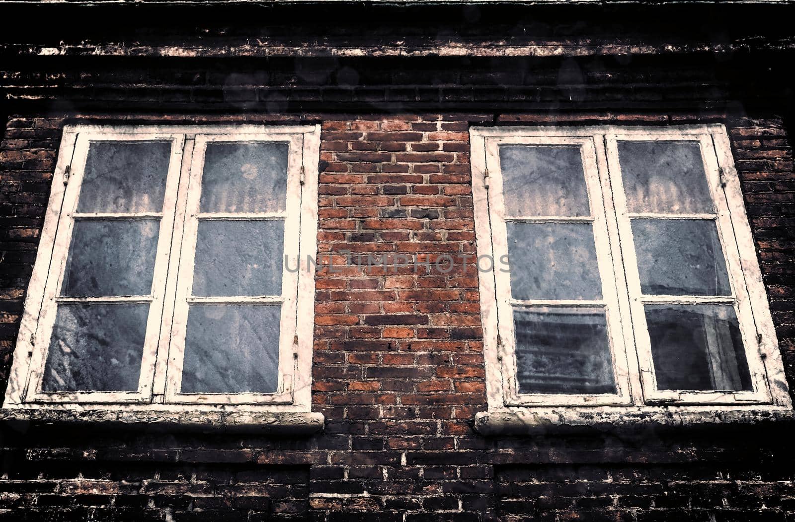 Aged and weathered old brick wall texture in a vintage retro design 