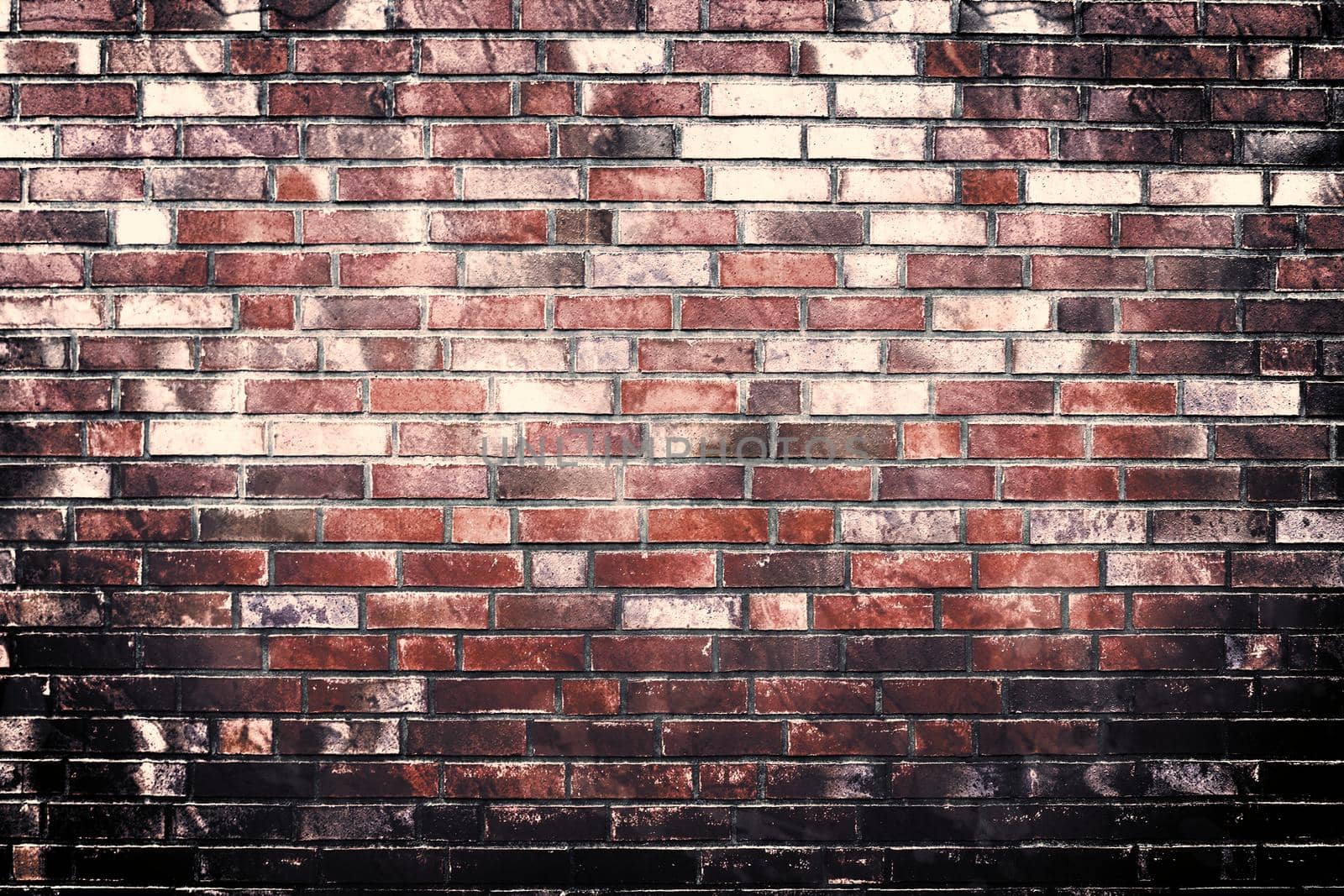 Aged and weathered old brick wall texture in a retro vintage design  by MP_foto71