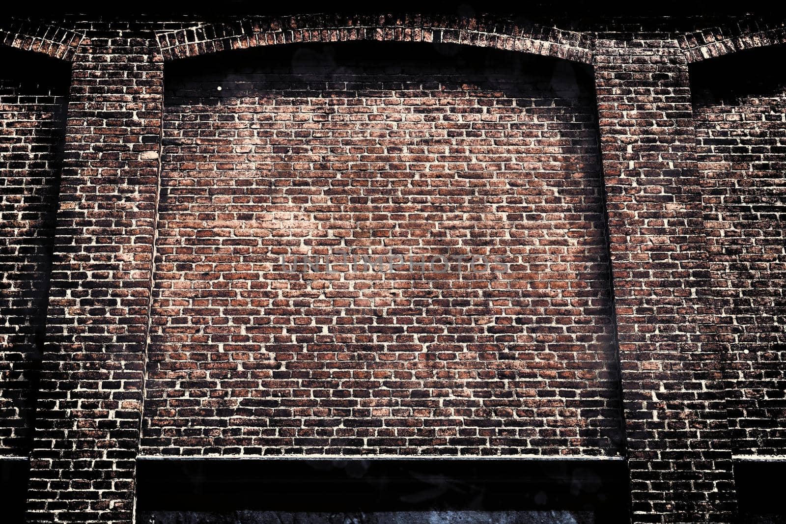 Aged and weathered old brick wall texture in a retro vintage design  by MP_foto71