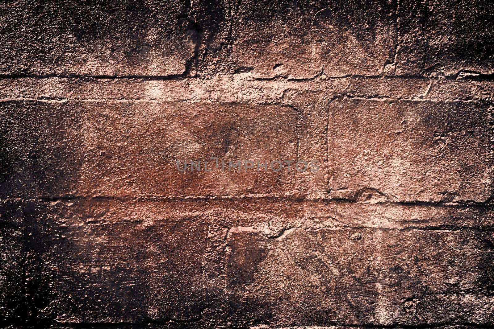 Aged and weathered old brick wall texture in a retro vintage design  by MP_foto71