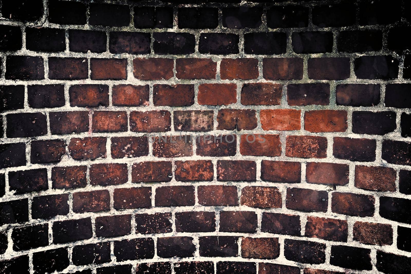 Aged and weathered old brick wall texture in a vintage retro design 