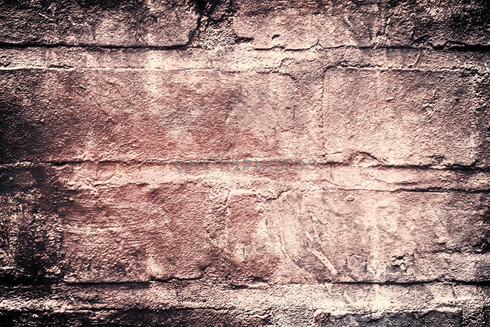 Aged and weathered old brick wall texture in a vintage retro design 