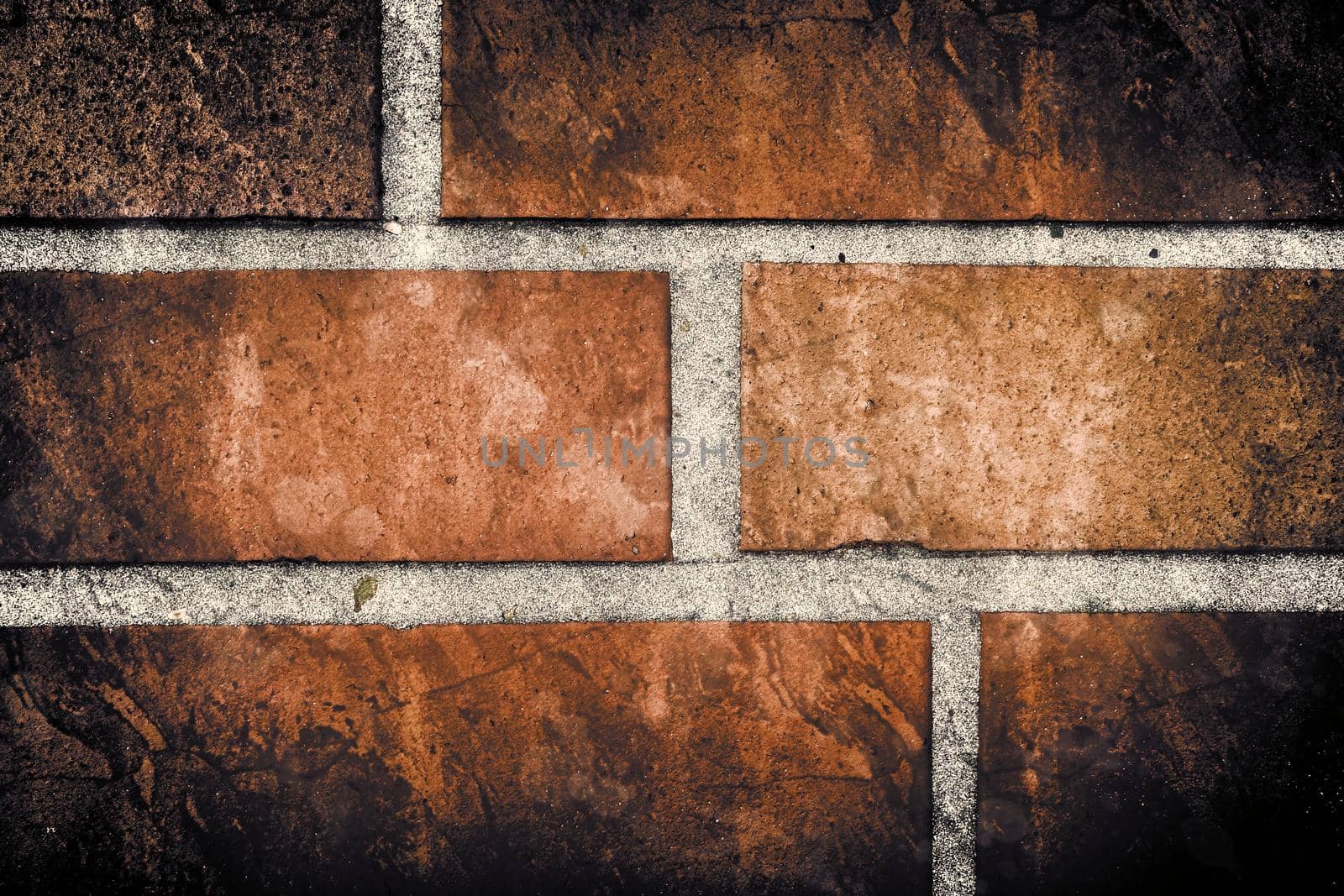 Aged and weathered old brick wall texture in a vintage retro design 