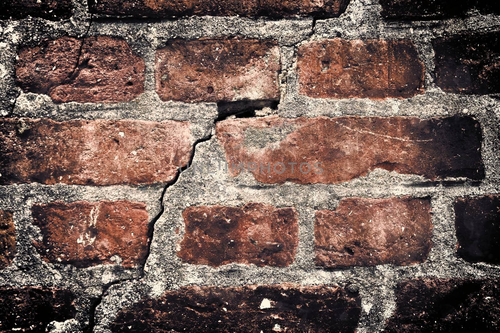 Aged and weathered old brick wall texture in a vintage retro design 