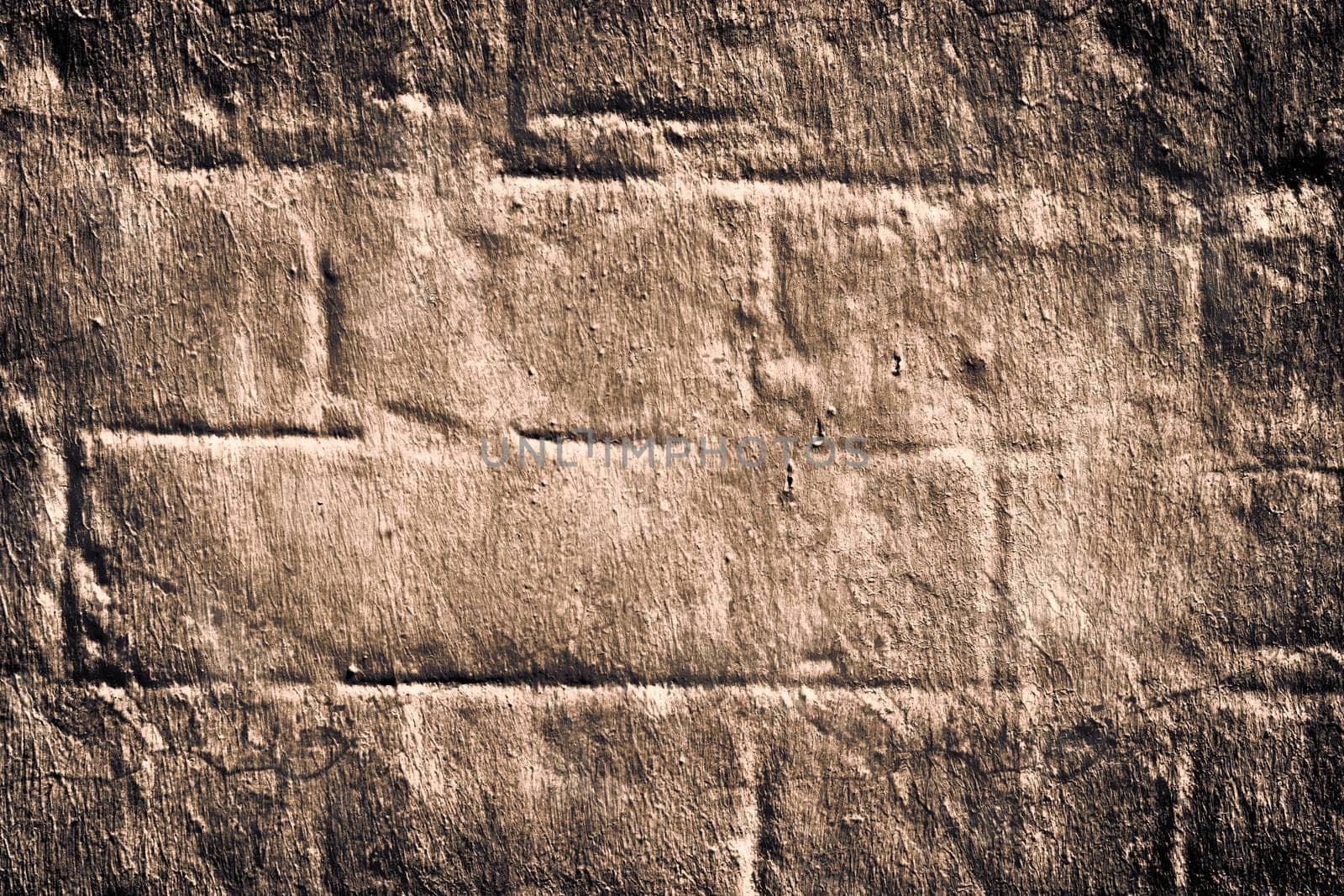 Aged and weathered old brick wall texture in a retro vintage design  by MP_foto71