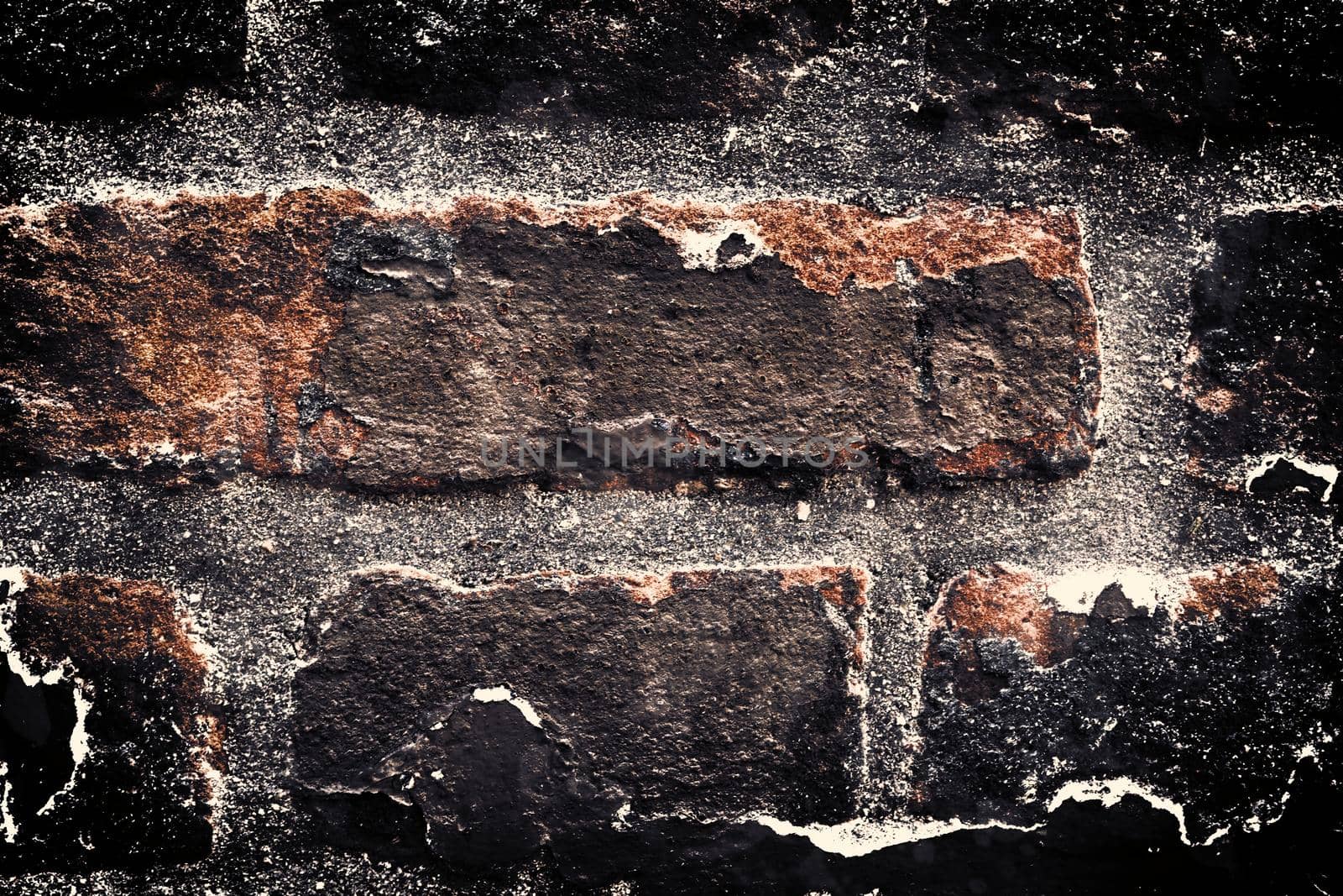 Aged and weathered old brick wall texture in a retro vintage design  by MP_foto71