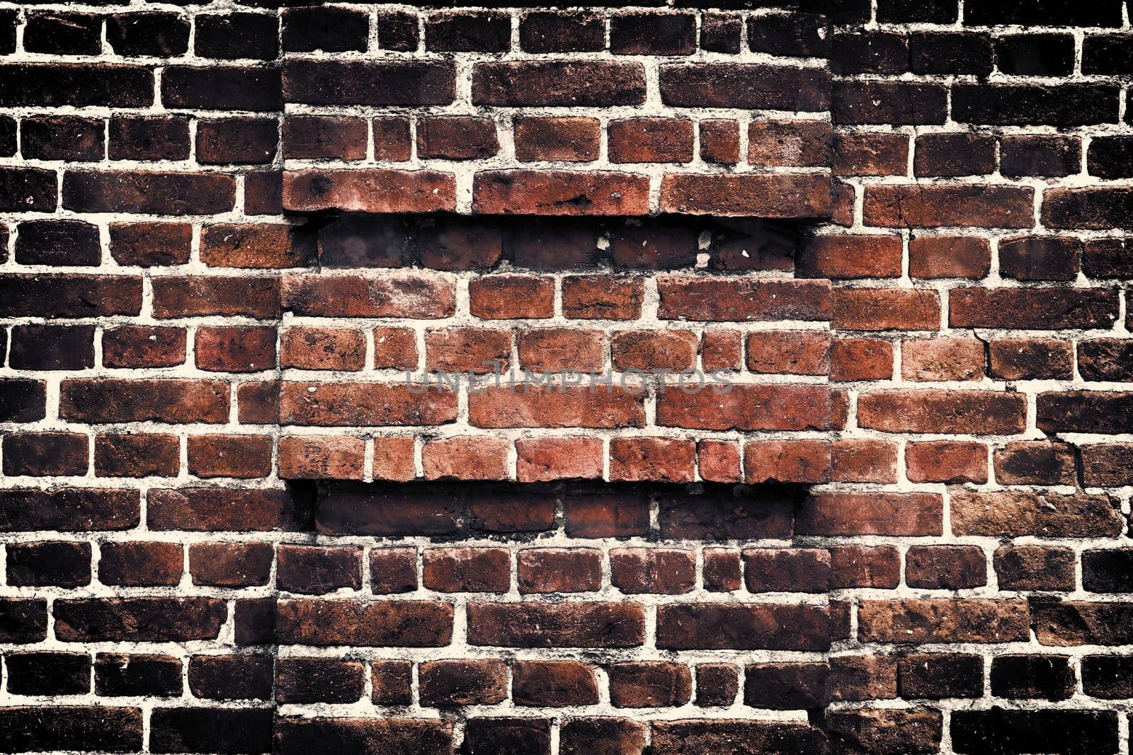 Aged and weathered old brick wall texture in a vintage retro design 