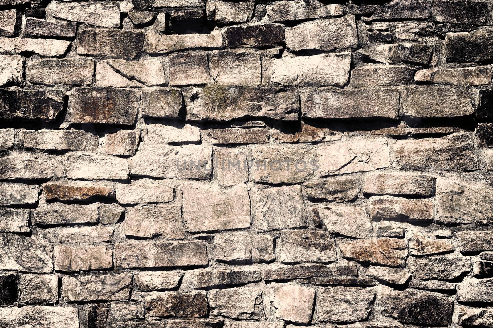 Aged and weathered old brick wall texture in a vintage retro design 