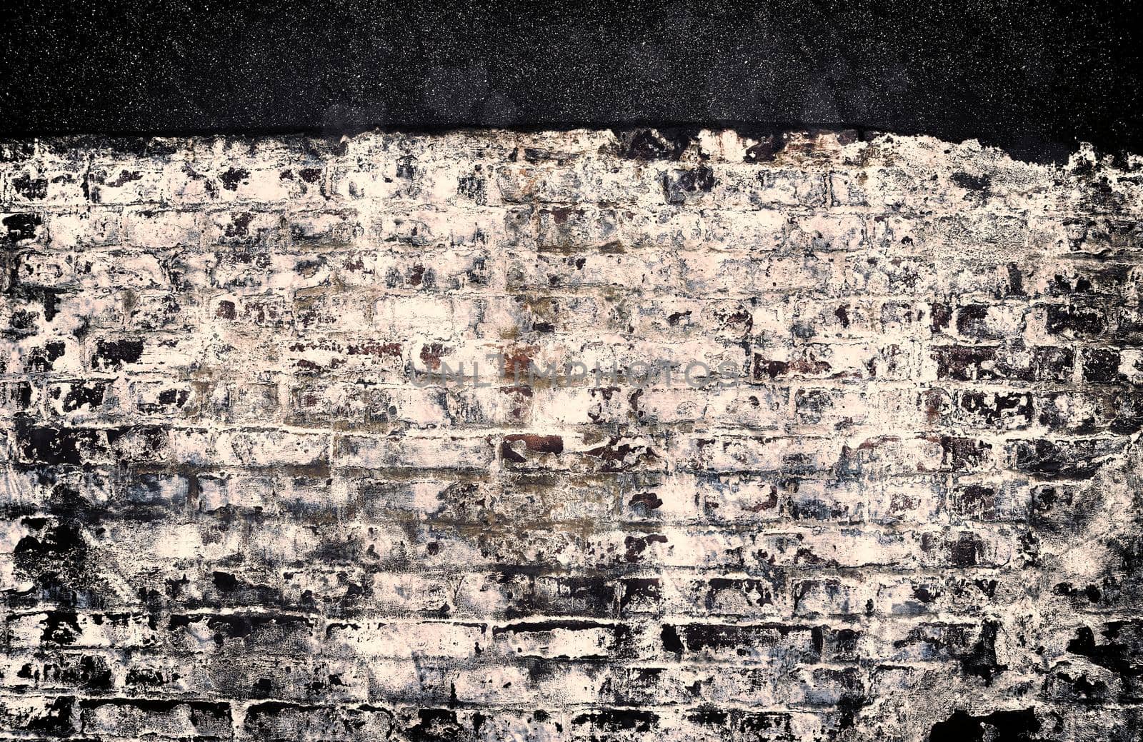 Aged and weathered old brick wall texture in a retro vintage design  by MP_foto71