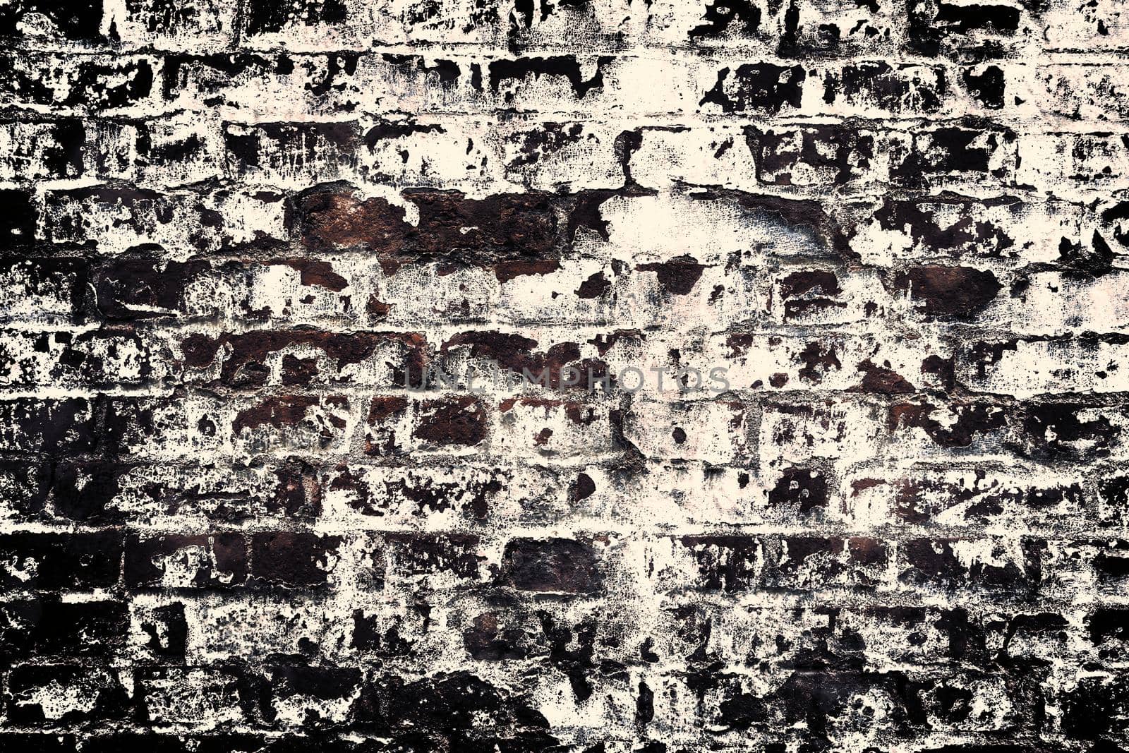 Aged and weathered old brick wall texture in a retro vintage design  by MP_foto71