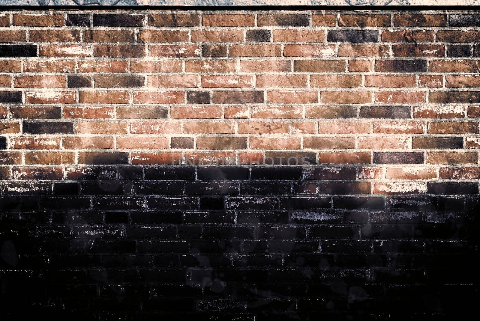 Aged and weathered old brick wall texture in a vintage retro design 