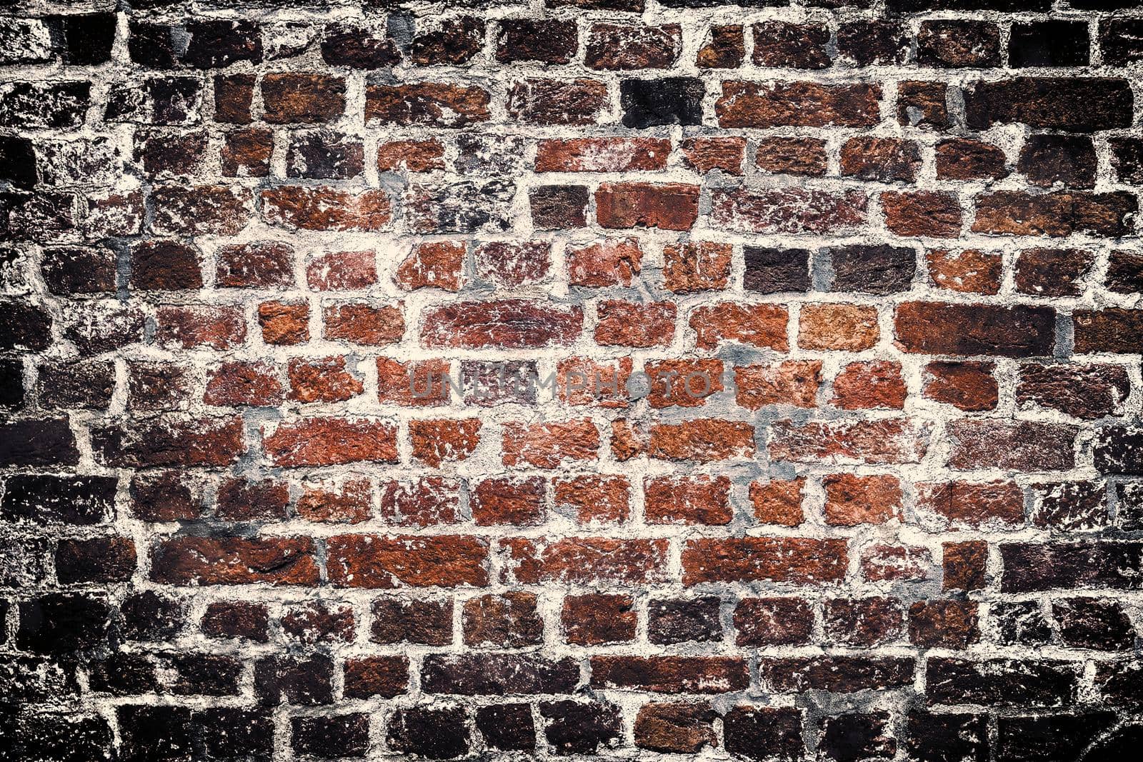 Aged and weathered old brick wall texture in a vintage retro design 