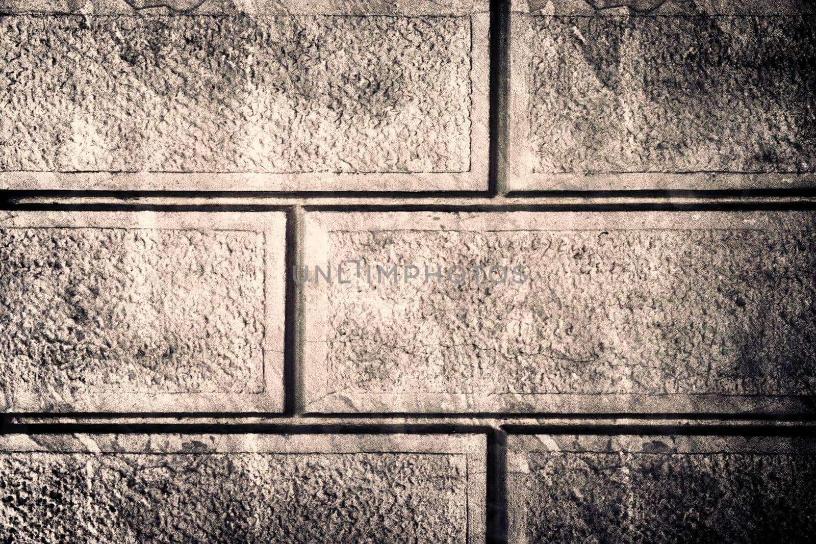 Aged and weathered old brick wall texture in a vintage retro design 