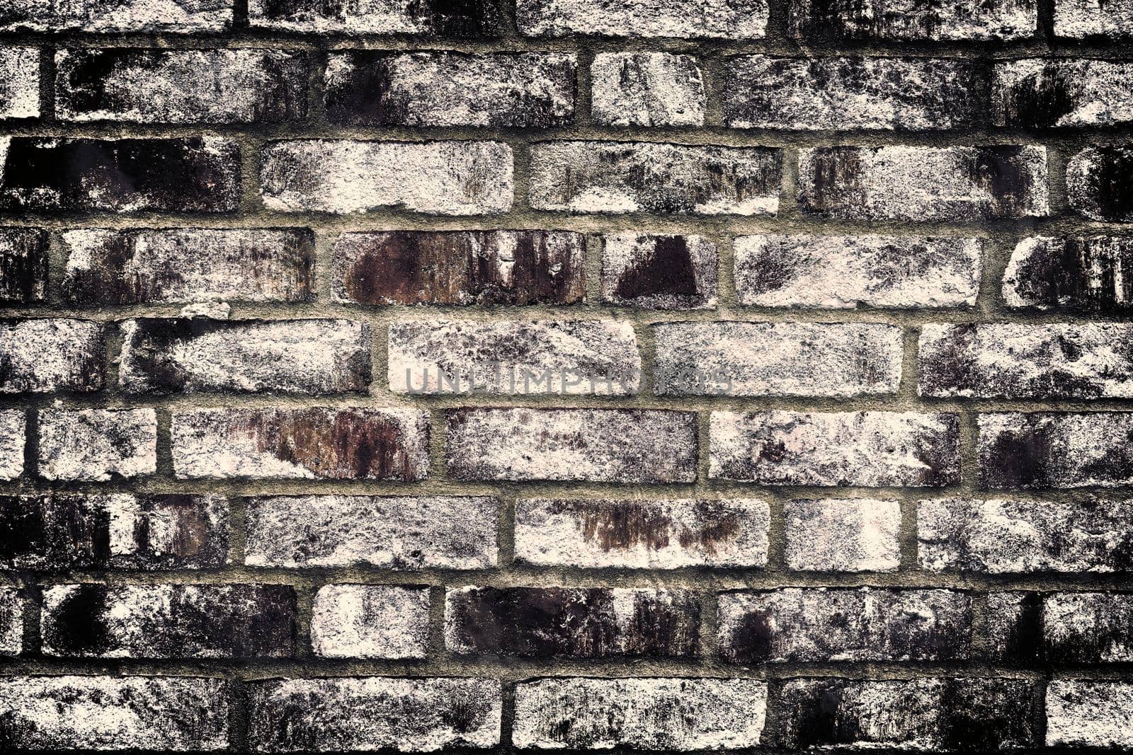 Aged and weathered old brick wall texture in a vintage retro design 