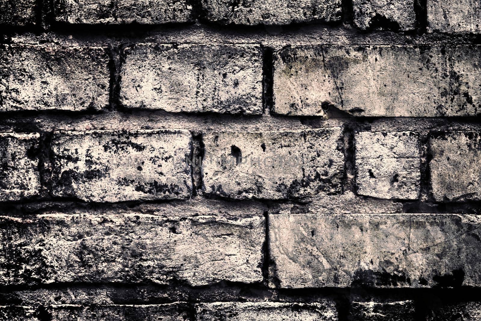 Aged and weathered old brick wall texture in a vintage retro design 