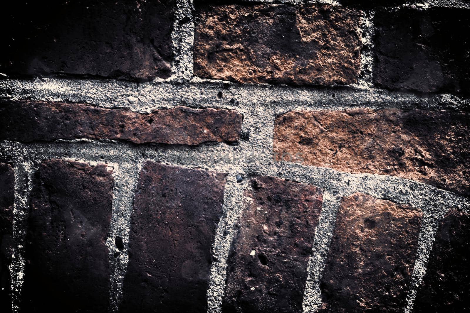 Aged and weathered old brick wall texture in a vintage retro design 