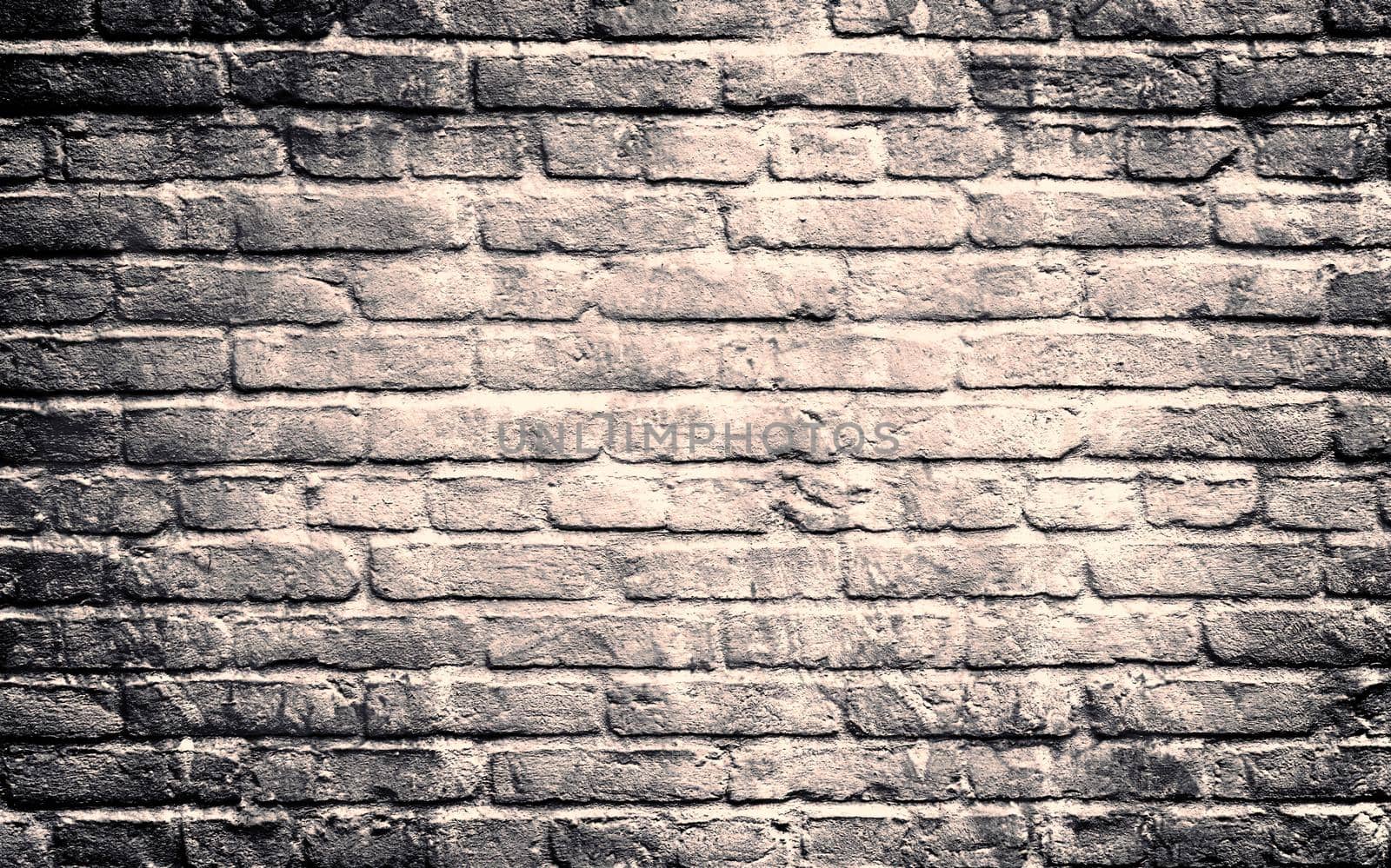 Aged and weathered old brick wall texture in a vintage retro design 