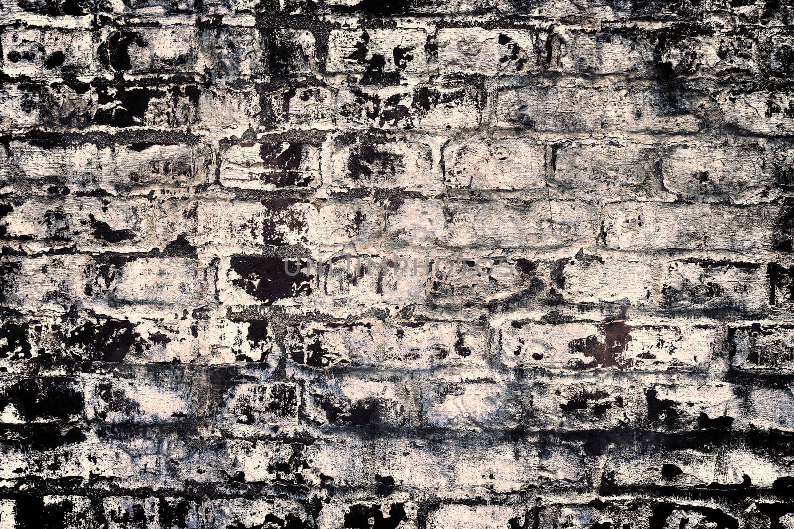 Aged and weathered old brick wall texture in a vintage retro design 