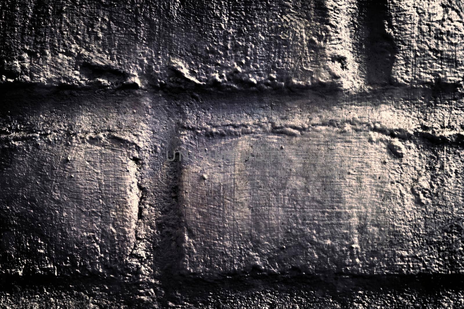 Aged and weathered old brick wall texture in a vintage retro design 