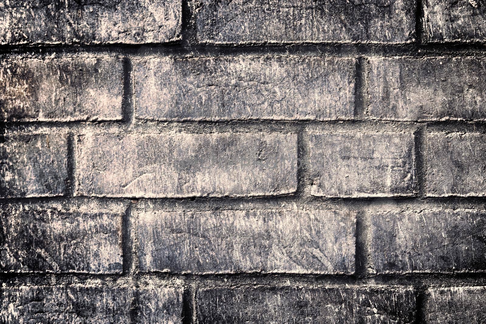 Aged and weathered old brick wall texture in a vintage retro design 