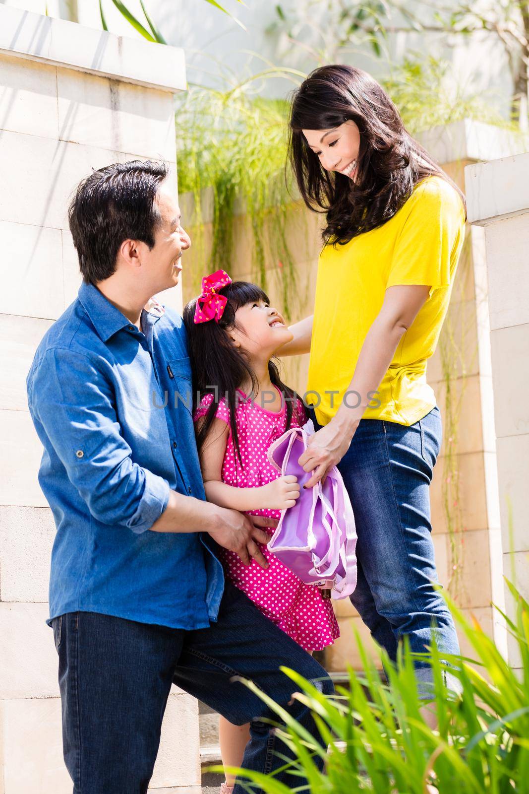 Chinese Family sending girl to school by Kzenon