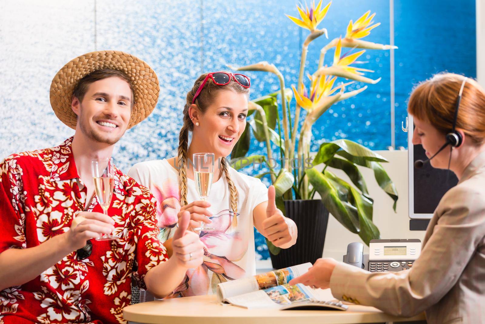 Man and woman recommending travel agency being satisfied with the service