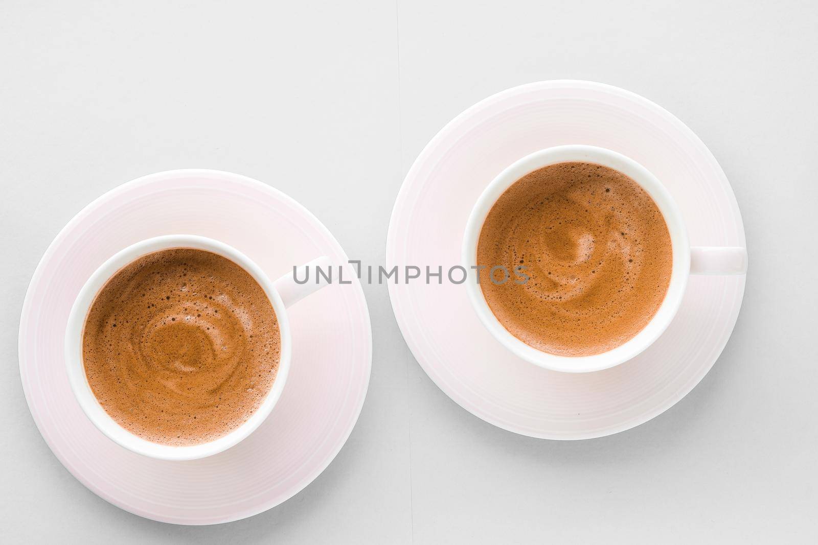 Cup of hot french coffee as breakfast drink, flatlay cups on white background by Anneleven