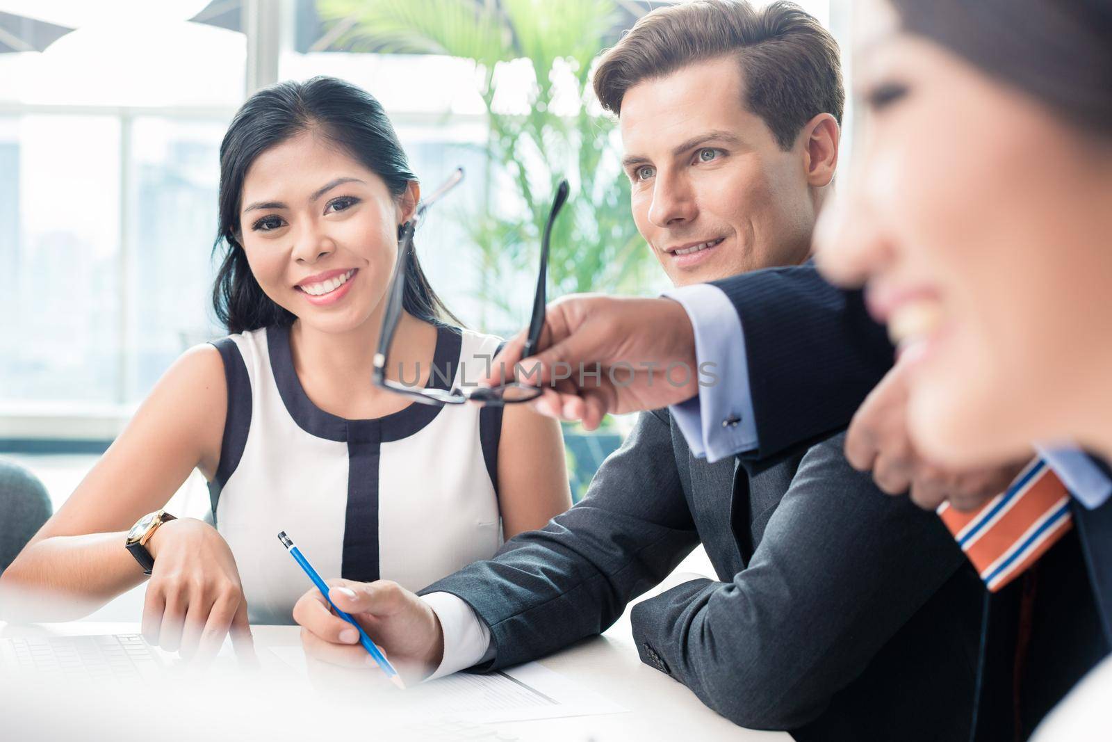 Business people discussing in meeting, diverse ethnicities