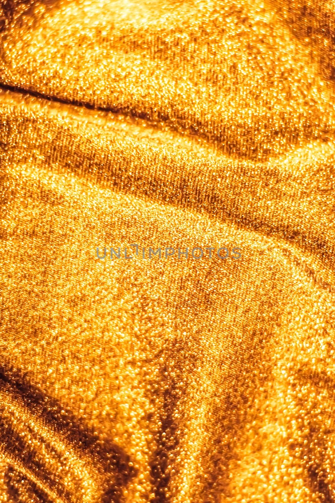 Golden holiday sparkling glitter abstract background, luxury shiny fabric material for glamour design and festive invitation by Anneleven