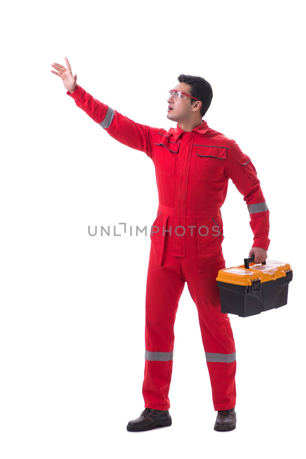 Contractor worker in red coveralls with toolbox isolated on white