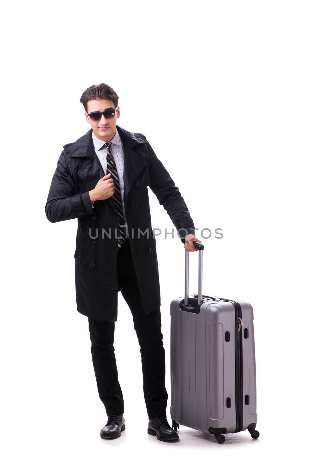 Young businessman with suitcase ready for business trip on white