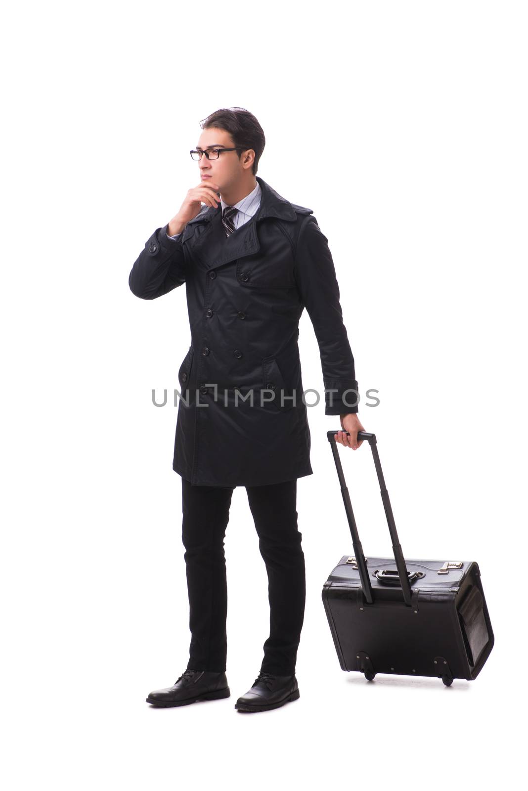Young businessman with suitcase ready for business trip on white