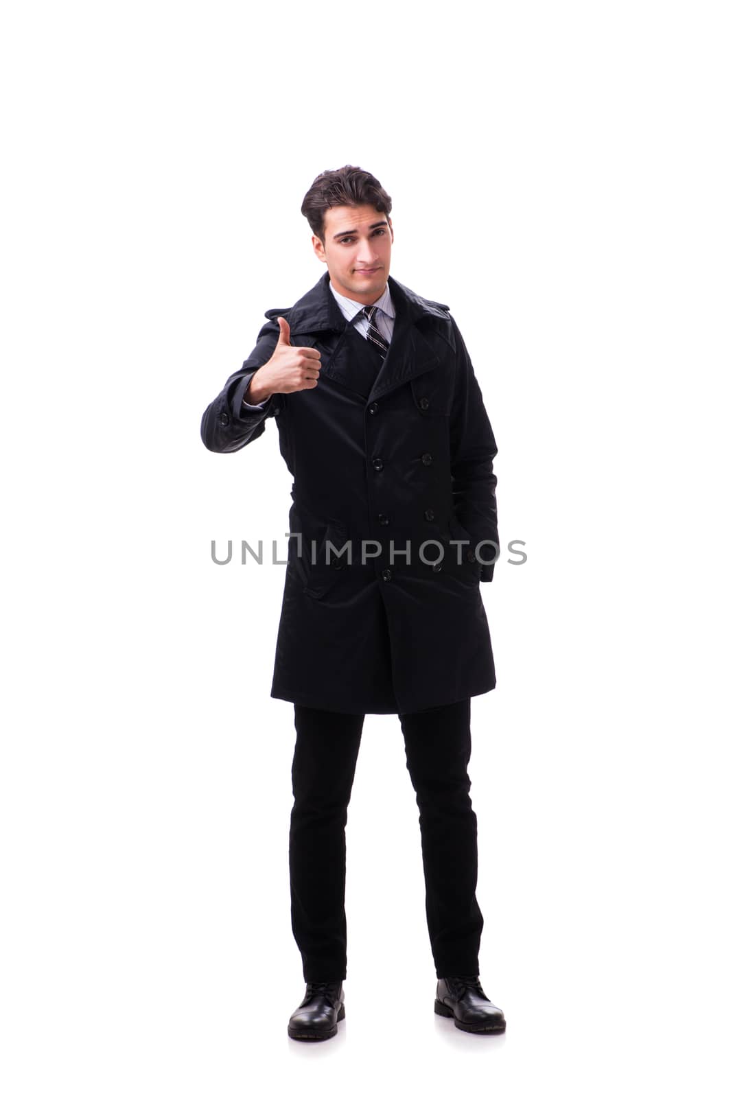 Young businessman wearing winter coat isolated on white