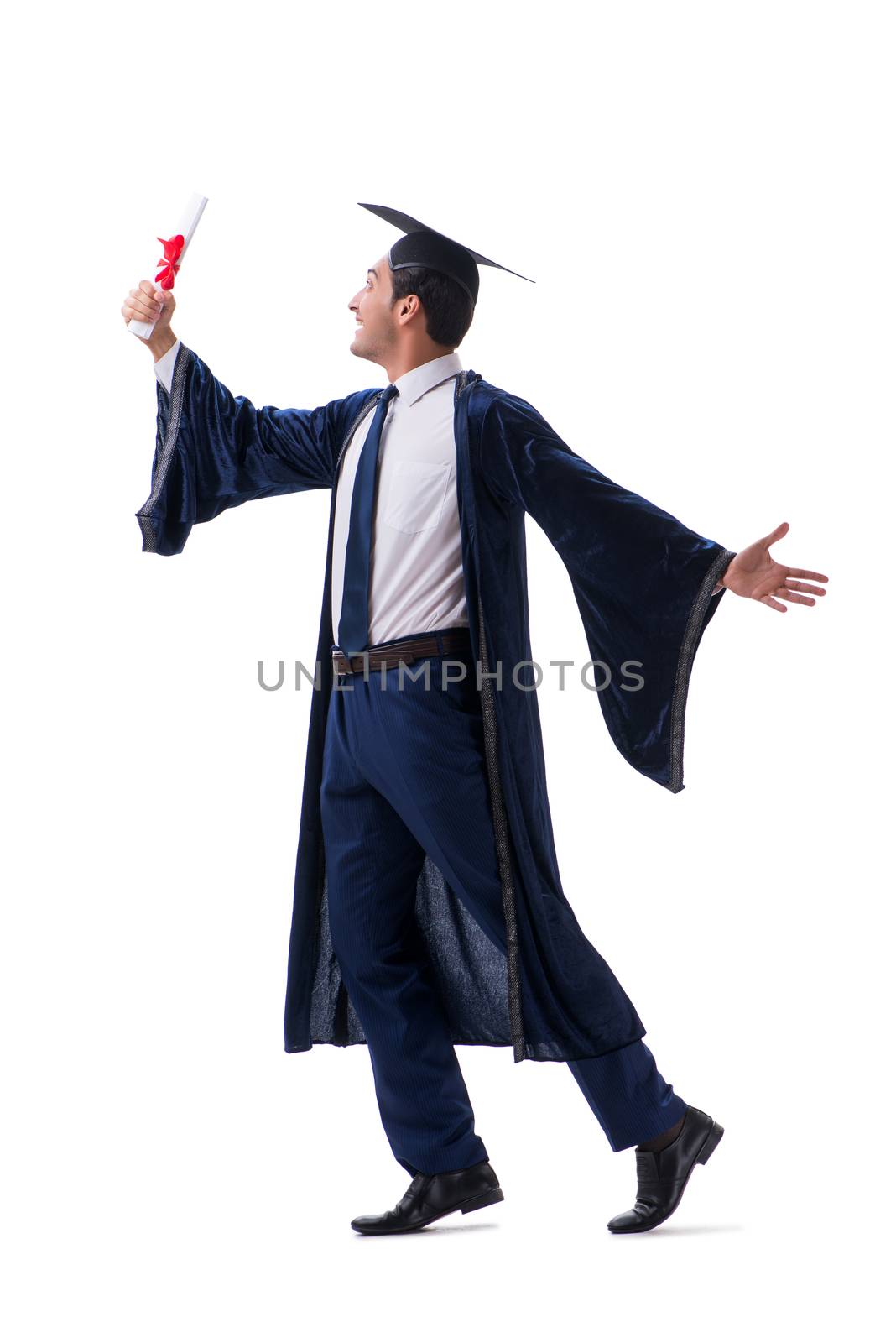 Student excited at his graduation isolated on white