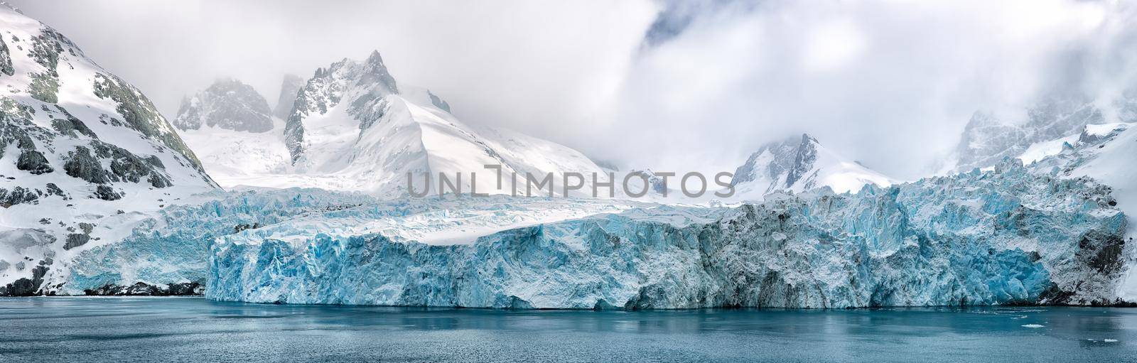 Panoramic image of polar caps in antarctica, polar caps near water in antarctica by isaiphoto