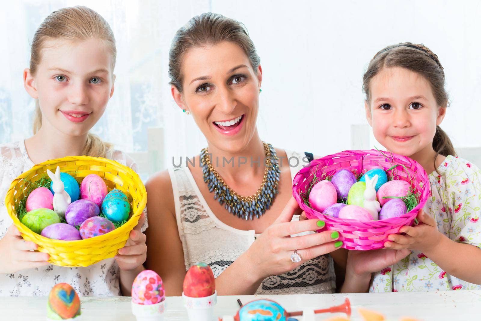 Basket with Easter eggs having been colored by family