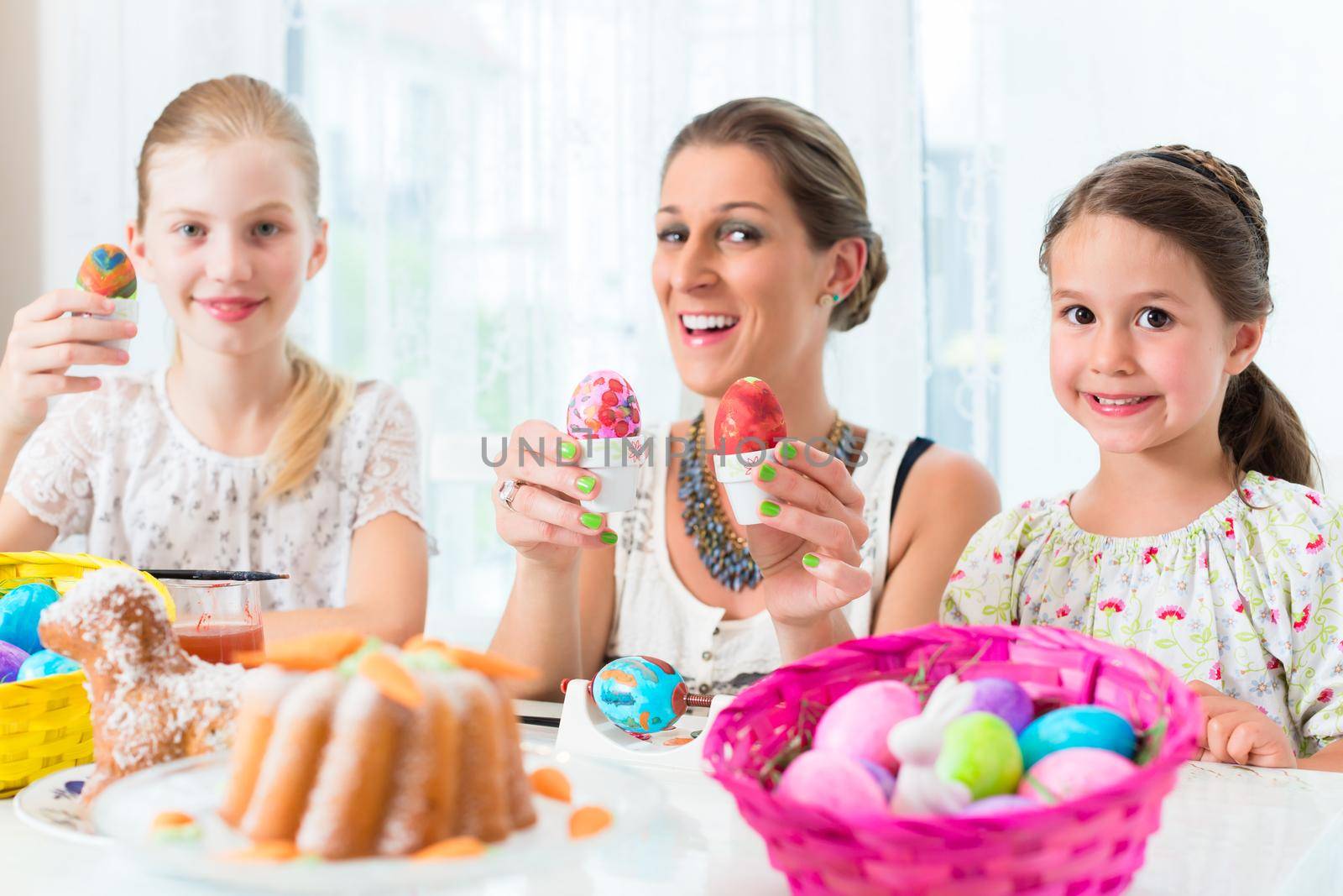 Basket with Easter eggs having been colored by family