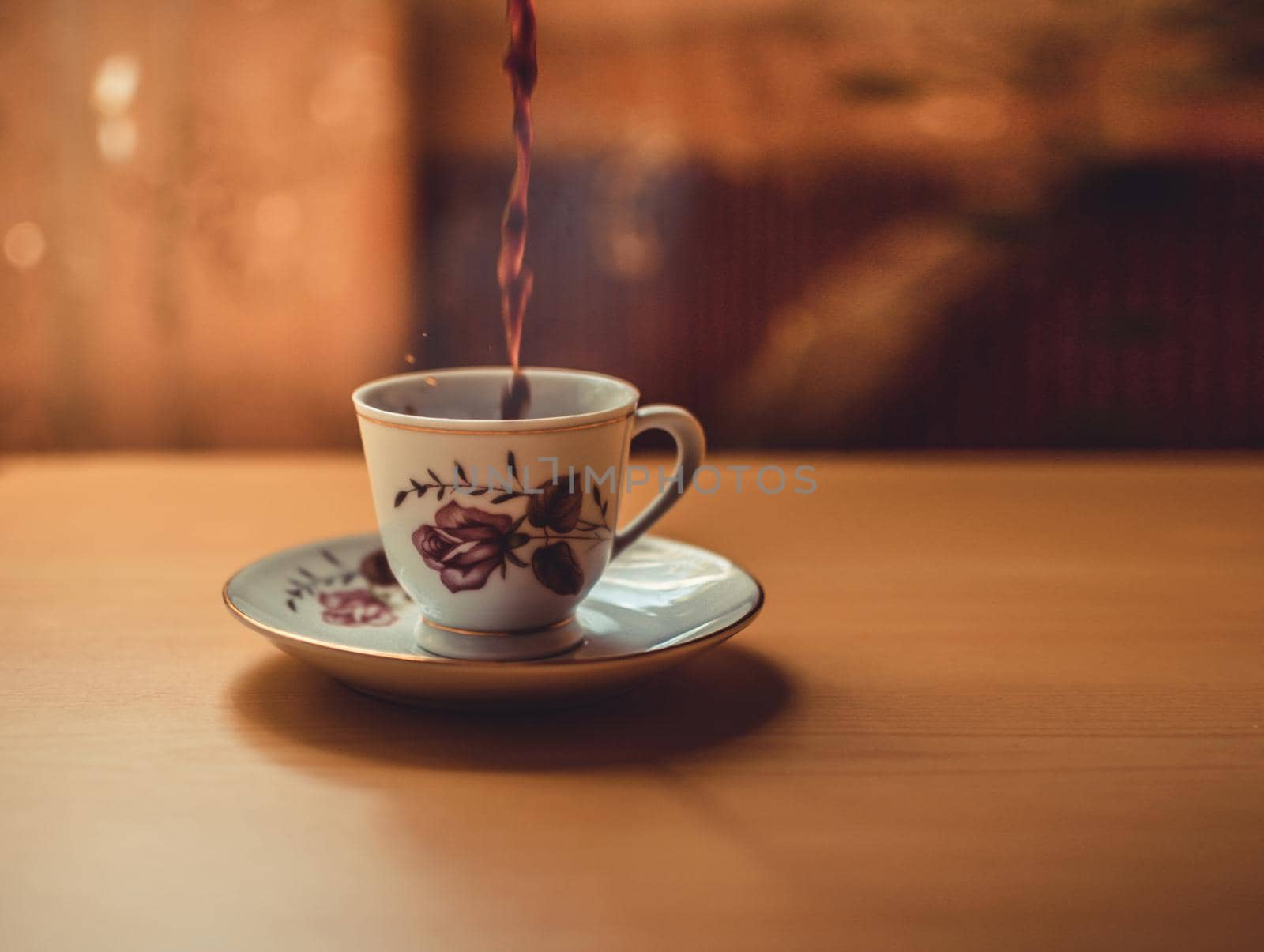 Photo of a cup of freshly brewed coffee, cup of coffee on wooden background, cup of coffee with copy space