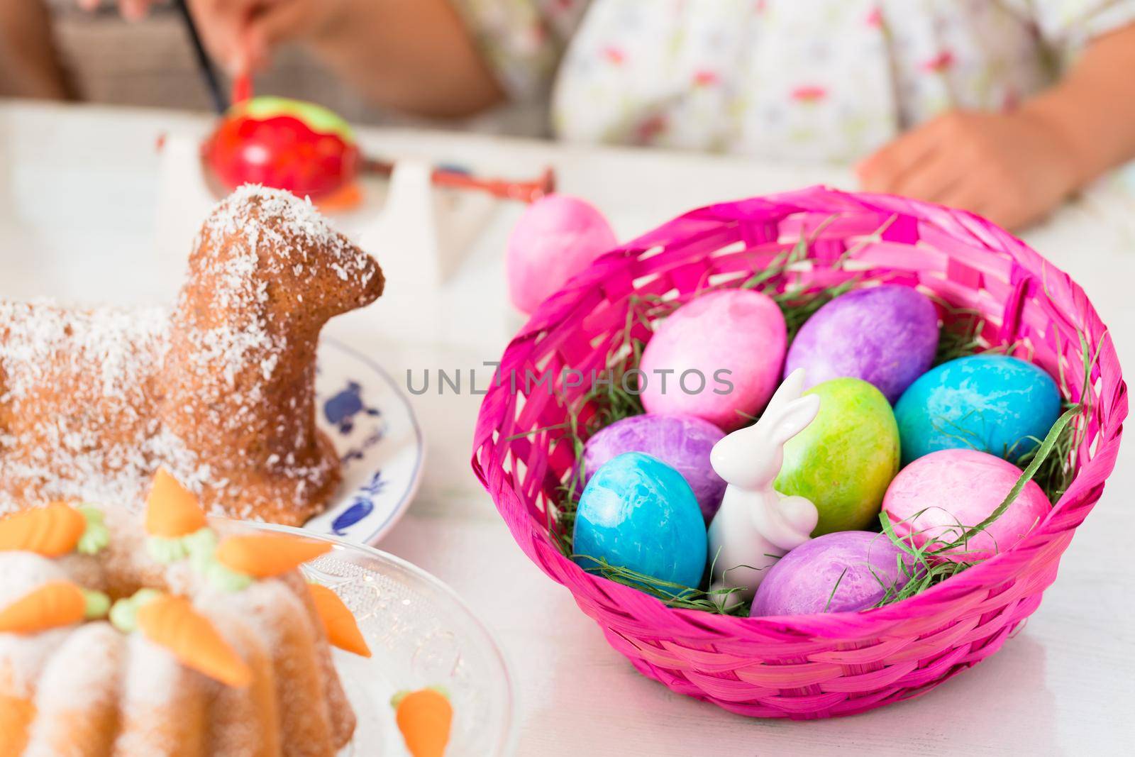 Basket with Easter eggs having been colored by family