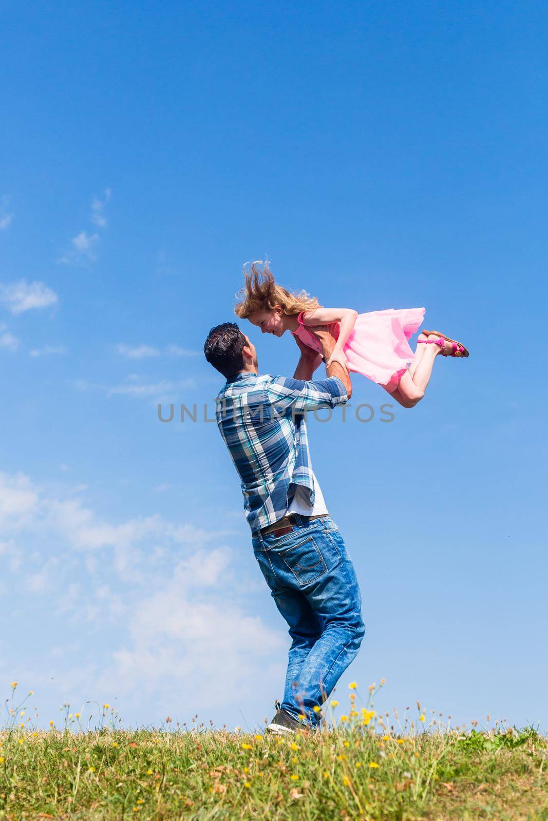 Daddy spinning around his daughter by Kzenon